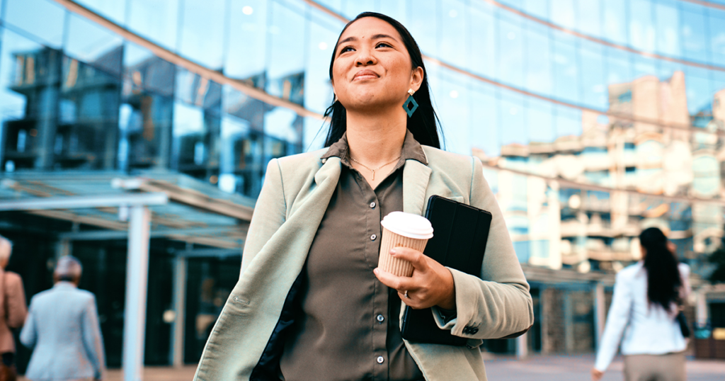 Woman in front of office building